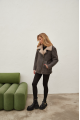 Women's sheepskin coat of gray color in vintage style