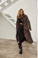 Long two-sided sheepskin coat made of natural sheepskin in coffee color