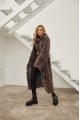 Long two-sided sheepskin coat made of natural sheepskin in coffee color