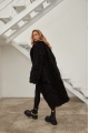 Long two-sided sheepskin coat made of black natural sheepskin