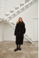 Long two-sided sheepskin coat made of black natural sheepskin