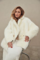 Two-sided white sheepskin coat made of natural cashmere lamb