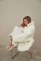 Two-sided white sheepskin coat made of natural cashmere lamb