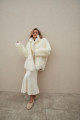 Two-sided white sheepskin coat made of natural cashmere lamb