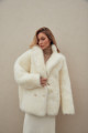 Two-sided white sheepskin coat made of natural cashmere lamb