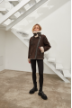 Stylish women's sheepskin coat of chocolate color made of natural sheepskin in VINTAGE style