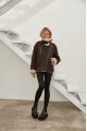 Stylish women's sheepskin coat of chocolate color made of natural sheepskin in VINTAGE style