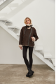 Stylish women's sheepskin coat of chocolate color made of natural sheepskin in VINTAGE style