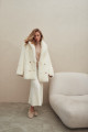 Two-sided sheepskin coat made of natural white cashmere lamb