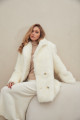 Two-sided sheepskin coat made of natural white cashmere lamb