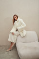 Two-sided sheepskin coat made of natural white cashmere lamb