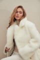 Two-sided sheepskin coat made of natural white cashmere lamb