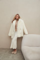 Two-sided sheepskin coat made of natural white cashmere lamb