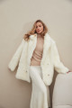 Two-sided sheepskin coat made of natural white cashmere lamb