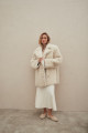 Curly double-sided sheepskin jacket made of natural white sheepskin in OVERSIZE style