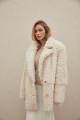 Curly double-sided sheepskin jacket made of natural white sheepskin in OVERSIZE style