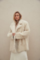 Curly double-sided sheepskin jacket made of natural white sheepskin in OVERSIZE style