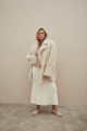 Curly double-sided sheepskin jacket made of natural white sheepskin in OVERSIZE style