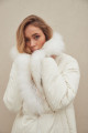 Women's long white down jacket with natural filler and fox fur decoration