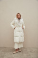 Women's long white down jacket with natural filler and fox fur decoration