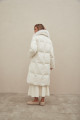 Women's long white down jacket with natural filler and fox fur decoration