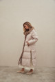 Long down jacket of beige color with mink fur and natural filler