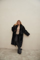 Long sheepskin coat made of natural black cashmere lamb