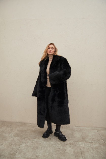 Long black sheepskin coat