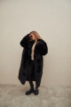 Long sheepskin coat made of natural black cashmere lamb