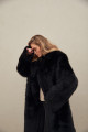 Long sheepskin coat made of natural black cashmere lamb