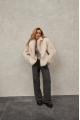 Women's two-sided sheepskin jacket made of natural cashmere lamb