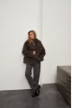 Short two-sided sheepskin coat made of natural sheepskin in coffee color