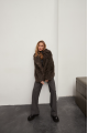 Short two-sided sheepskin coat made of natural sheepskin in coffee color