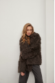 Short two-sided sheepskin coat made of natural sheepskin in coffee color