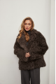 Short two-sided sheepskin coat made of natural sheepskin in coffee color