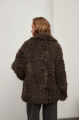 Short two-sided sheepskin coat made of natural sheepskin in coffee color