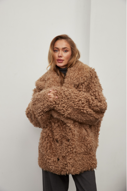 Two-sided sheepskin coat in camel color