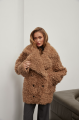 Stylish two-sided sheepskin coat made of natural sheepskin in camel color