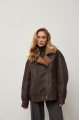 A stylish chocolate-colored sheepskin coat made of natural sheepskin in the VINTAGE style