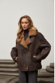 A stylish chocolate-colored sheepskin coat made of natural sheepskin in the VINTAGE style