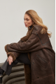 Stylish long sheepskin coat made of natural chocolate-colored sheepskin in VINTAGE style