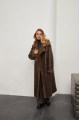 Stylish long sheepskin coat made of natural chocolate-colored sheepskin in VINTAGE style