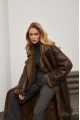 Stylish long sheepskin coat made of natural chocolate-colored sheepskin in VINTAGE style