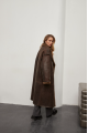 Stylish long sheepskin coat made of natural chocolate-colored sheepskin in VINTAGE style