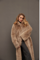 Long sheepskin coat made of natural cashmere lamb in brown color