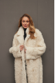 Long curly two-sided sheepskin coat of white color made of natural sheepskin in OVERSIZE style