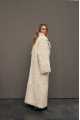 Long curly two-sided sheepskin coat of white color made of natural sheepskin in OVERSIZE style