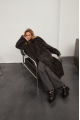 Curly two-sided brownie sheepskin coat made of natural sheepskin in OVERSIZE style