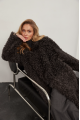 Curly two-sided brownie sheepskin coat made of natural sheepskin in OVERSIZE style