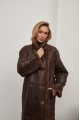 A stylish sheepskin coat made of natural chocolate-colored sheepskin in the VINTAGE style